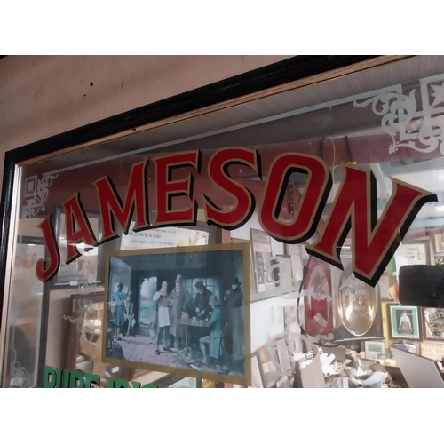 336 - 1970's Jameson Pure Irish Whiskey framed advertising mirror. {57 cm H x 87 cm W}.