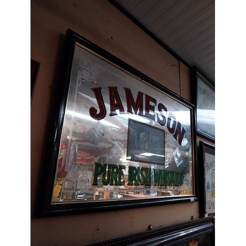 336 - 1970's Jameson Pure Irish Whiskey framed advertising mirror. {57 cm H x 87 cm W}.