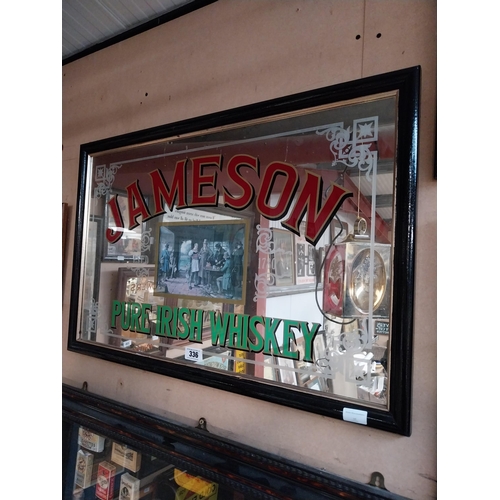 336 - 1970's Jameson Pure Irish Whiskey framed advertising mirror. {57 cm H x 87 cm W}.