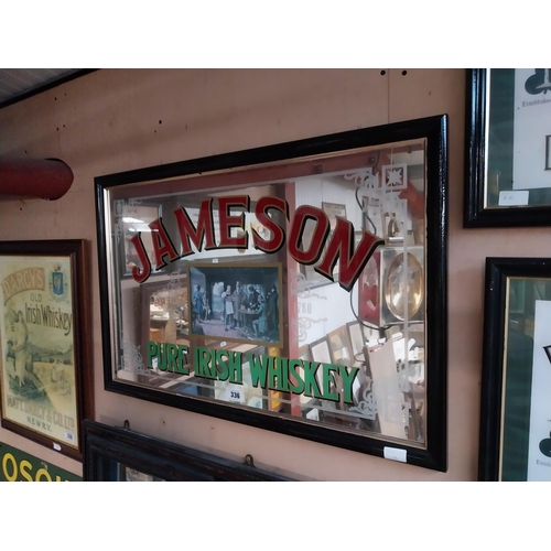 336 - 1970's Jameson Pure Irish Whiskey framed advertising mirror. {57 cm H x 87 cm W}.