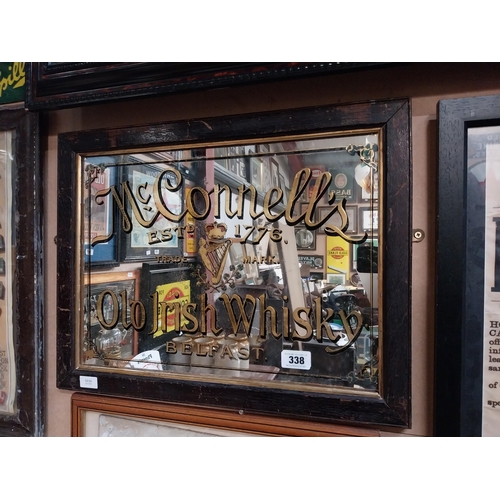 338 - McConnell's Old Irish Whisky Belfast framed advertising mirror. {43 cm H x 64 cm  W}.