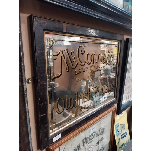 338 - McConnell's Old Irish Whisky Belfast framed advertising mirror. {43 cm H x 64 cm  W}.