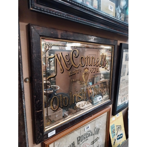 338 - McConnell's Old Irish Whisky Belfast framed advertising mirror. {43 cm H x 64 cm  W}.