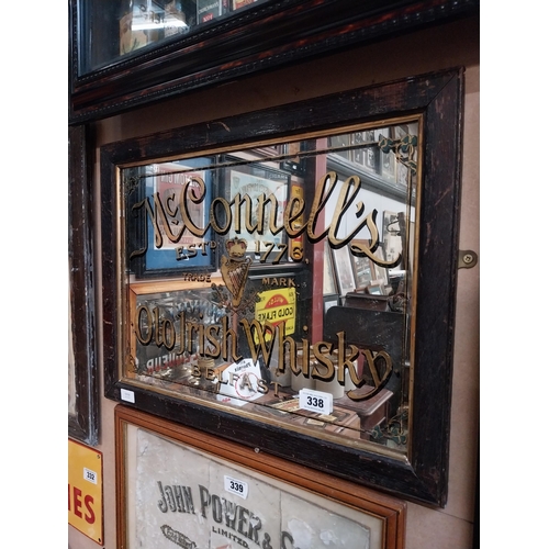 338 - McConnell's Old Irish Whisky Belfast framed advertising mirror. {43 cm H x 64 cm  W}.