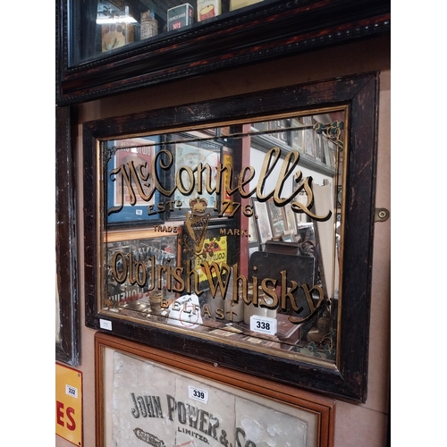 338 - McConnell's Old Irish Whisky Belfast framed advertising mirror. {43 cm H x 64 cm  W}.