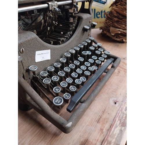 344 - 1950's Underwood typewriter. {27 cm H x 36 cm W x 31 cm D}.