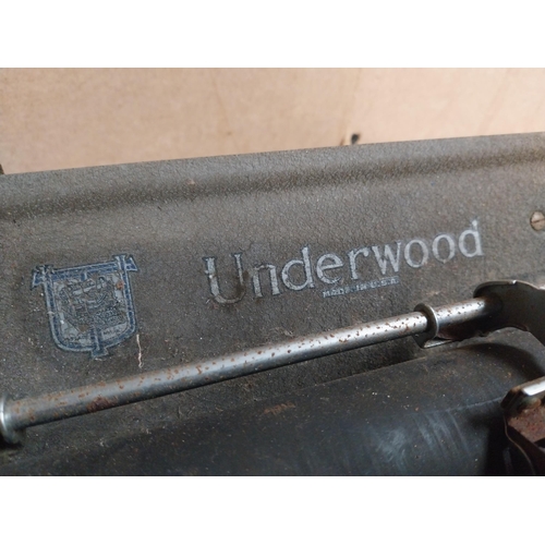 344 - 1950's Underwood typewriter. {27 cm H x 36 cm W x 31 cm D}.