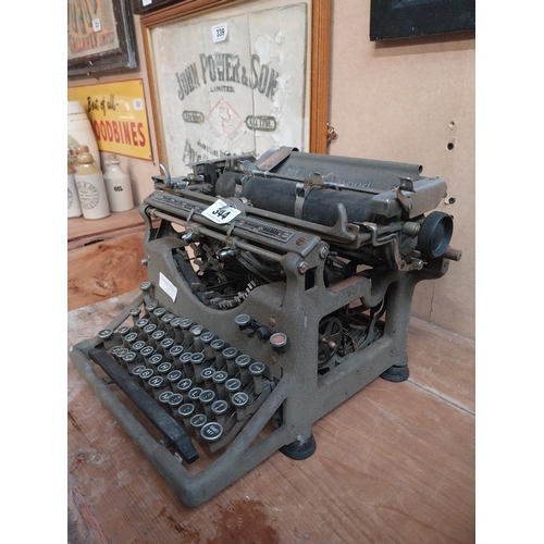 344 - 1950's Underwood typewriter. {27 cm H x 36 cm W x 31 cm D}.