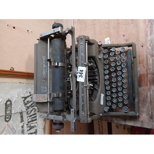 344 - 1950's Underwood typewriter. {27 cm H x 36 cm W x 31 cm D}.