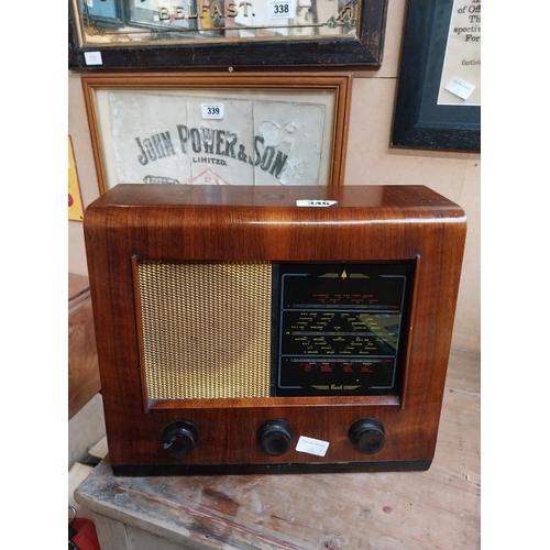 346 - 1950's wooden Bush radio. {34 cm H x 32 cm W x 18 cm D}.