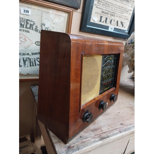 346 - 1950's wooden Bush radio. {34 cm H x 32 cm W x 18 cm D}.