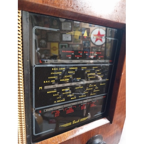 346 - 1950's wooden Bush radio. {34 cm H x 32 cm W x 18 cm D}.