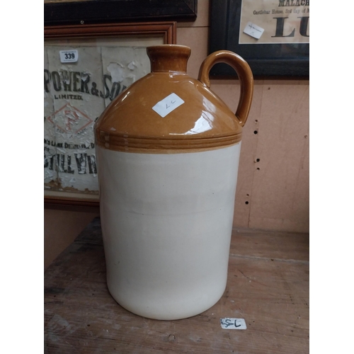 347 - Two stoneware flagons - two gallon and three gallon. {42 cm H x 23 cm Dia. and 32 cm H x 22 cm Dia}.