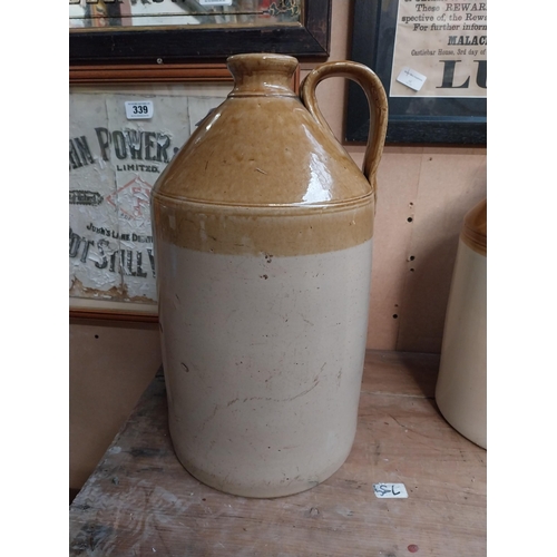 347 - Two stoneware flagons - two gallon and three gallon. {42 cm H x 23 cm Dia. and 32 cm H x 22 cm Dia}.