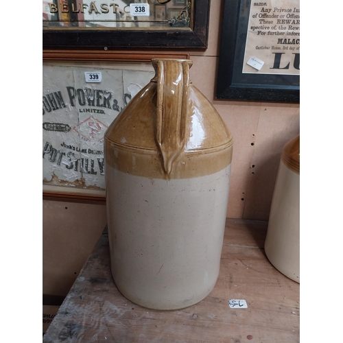 347 - Two stoneware flagons - two gallon and three gallon. {42 cm H x 23 cm Dia. and 32 cm H x 22 cm Dia}.