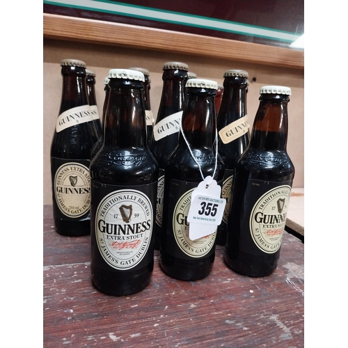 355 - Fourteen bottles of Guinness.