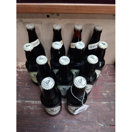 356 - Thirteen bottles of Guinness.