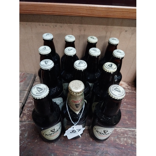 357 - Fourteen bottles of Guinness.