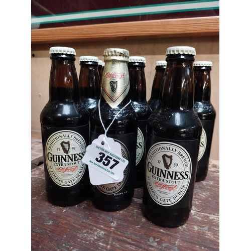 357 - Fourteen bottles of Guinness.