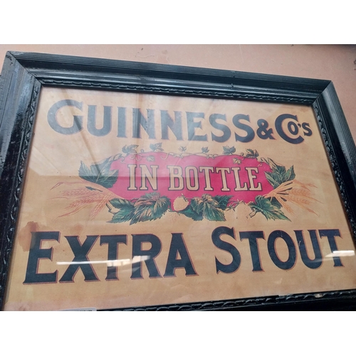 366 - Guinness Extra Stout in Bottle framed advertising print. {37 cm H x 50 cm W}.