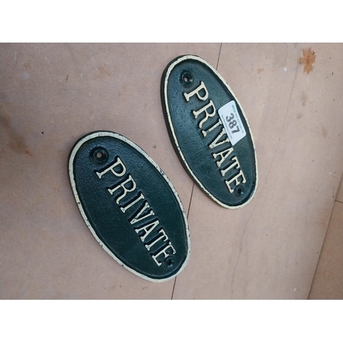 387 - Two cast iron Private door plaques. {9 cm H x 19 cm W}.