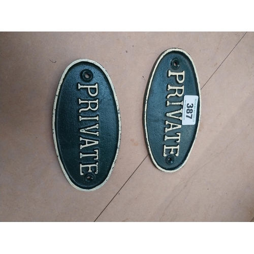 387 - Two cast iron Private door plaques. {9 cm H x 19 cm W}.