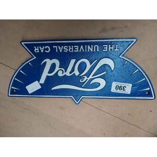 390 - Cast iron Ford The Universal Car wall plaque. {16 cm H x 36 cm W}.