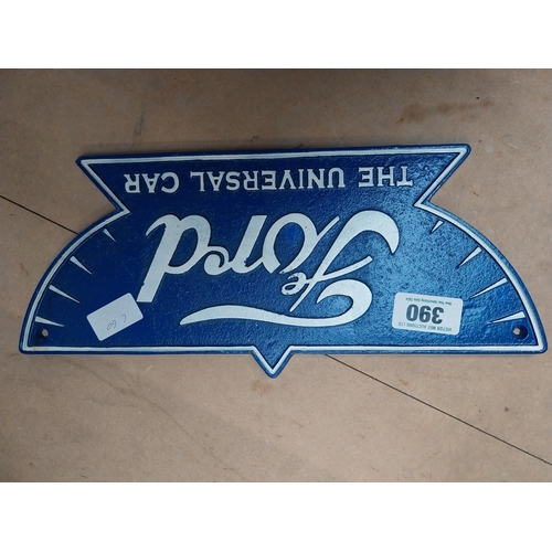 390 - Cast iron Ford The Universal Car wall plaque. {16 cm H x 36 cm W}.