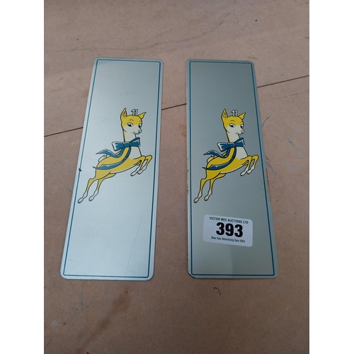 393 - Two 1970's Babycham tinplate plaques. {25 cm H x 9 cm W}.