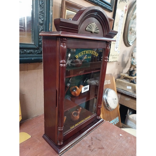 394 - Mahogany display cabinet Westminster Pipes including pipes. {52 cm H x 31 cm W}.