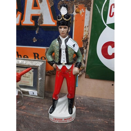 4 - Irish Mist ceramic advertising figure. {42 cm H x 12 cm W x 8 cm D}.