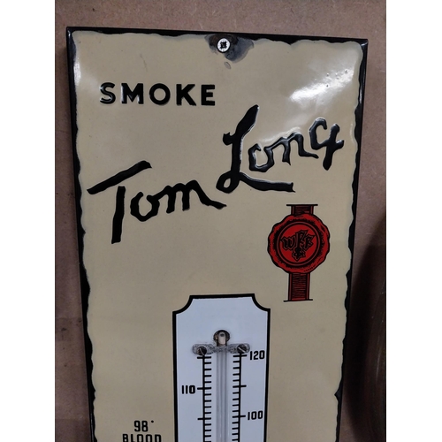 409 - Smoke Tom Long Grand old rich tobacco enamel advertising barometer. {57 cm H x 18 cm W}