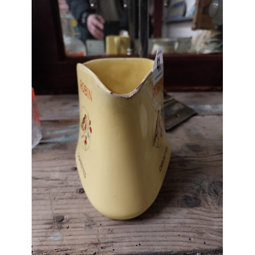 41 - Robin Cigarettes ceramic water jug. {12 cm H x 13 cm W x 11 cm D}.