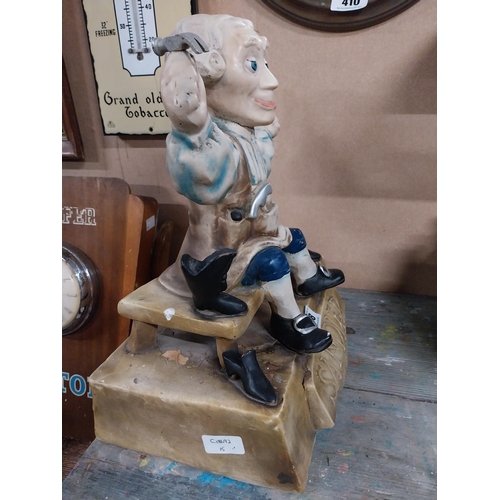 418 - Sandler of Boston Ruberoid Cobbler advertising figure. {46 cm H x 33 cm W x 20 cm D}