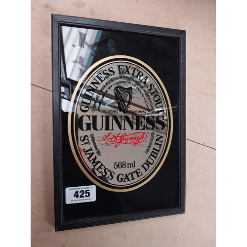 425 - Guinness Extra Stout framed advertising mirror. {32 cm H x 22 cm W}.