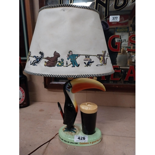 426 - Guinness Carltonware Toucan advertising lamp with original shade. {28 cm H x 17 cm W}.