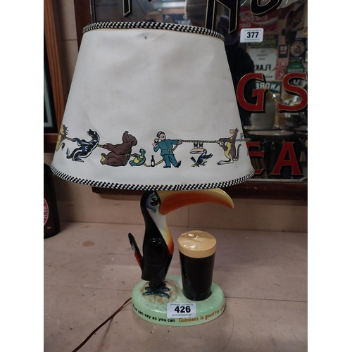 426 - Guinness Carltonware Toucan advertising lamp with original shade. {28 cm H x 17 cm W}.