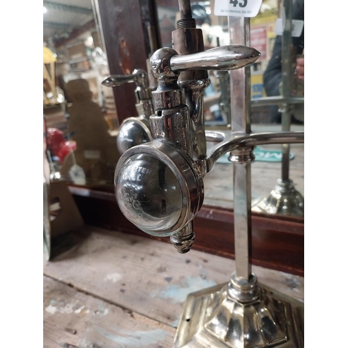 43 - Early 20th C. chrome and brass three bottle optic stand with original optics. {91 cm H x 31 cm W x 2... 