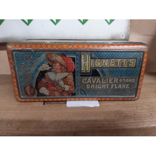 437 - Early 20th. C. Hignett's Cavalier tinplate tobacco tin. {7cm H X 18cm W X 8cm D}.