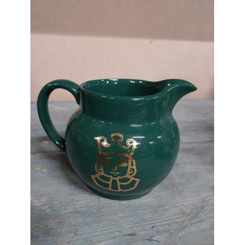 443 - Two Wade ceramic water jugs. {10 cm H x 15 cm W x 10 cm D}.