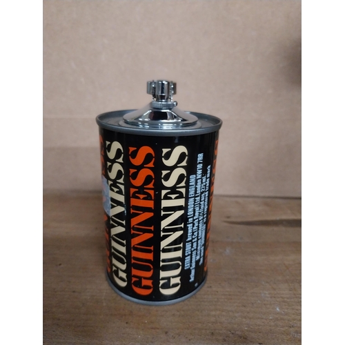 446 - Guinness advertising lighter. {12 cm H x 7 cm Dia.}.