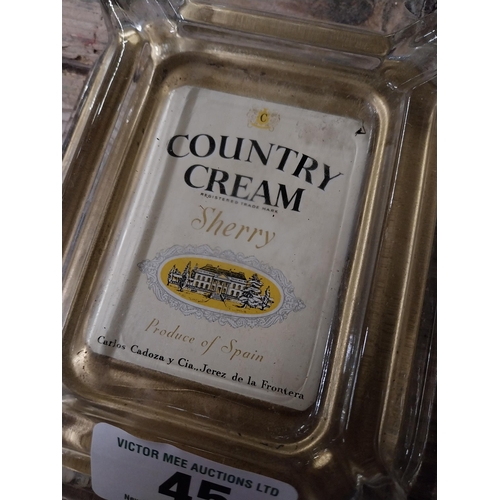 45 - Country Cream glass advertising ashtray. {13 cm H x 16 cm W}.