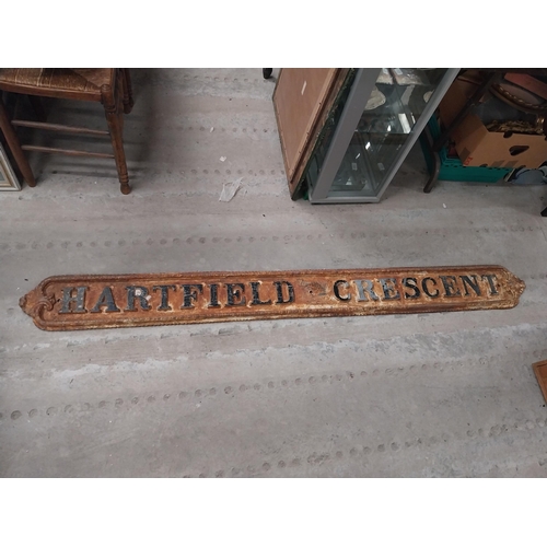 456 - 19th C. Hartfield Crescent cast iron street sign. {15 cm H x 190 cm W}.