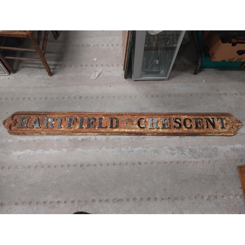 456 - 19th C. Hartfield Crescent cast iron street sign. {15 cm H x 190 cm W}.