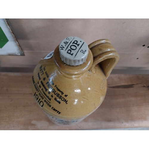 460 - Early 20th C. Watt and Ferguson Botanical Brewers Rotherham stoneware flagon with original stopper. ... 