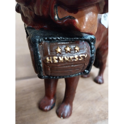 467 - Hennessey Cognac composition advertising Dog figure. {25 cm H x 20 cm W x 9 cm D}.