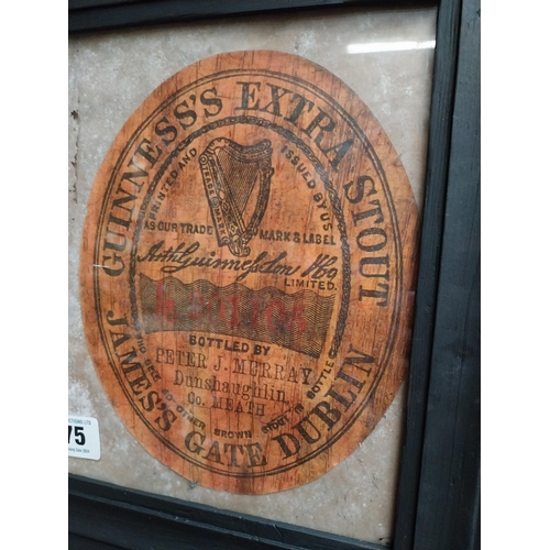 475 - Framed print of Guinness Labels. {34 cm H x 70 cm W}.