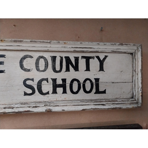 486 - Painted Wood Framed Maguiresbridge County Primary School sign {23 cm H x 106 cm W}.