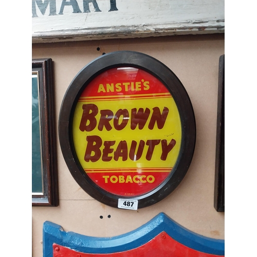 487 - Anstie's Brown Beauty Tobacco reverse painted glass advertising sign {36 cm H x 31 cm W}.