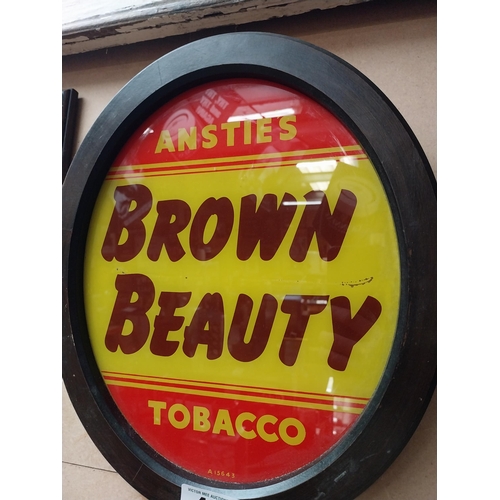 487 - Anstie's Brown Beauty Tobacco reverse painted glass advertising sign {36 cm H x 31 cm W}.